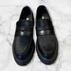 MOCASSINO DONNA PELLE NERA EFFETTO PELO SUOLA CARRARMATO